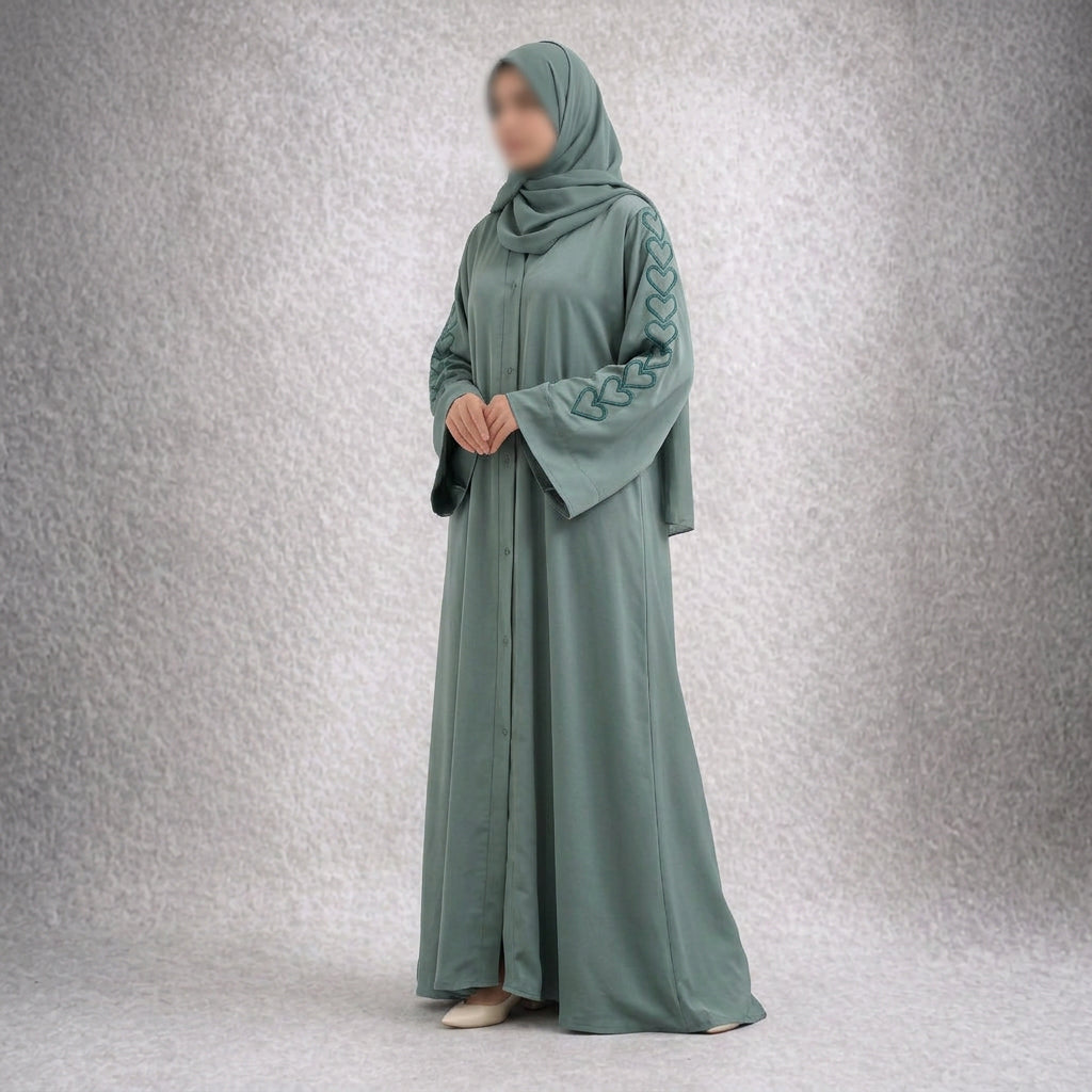 Sage Serenity – Pastel Green Heart-Embroidered Abaya